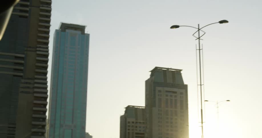 Exterior view of office buildings at sunset in the city