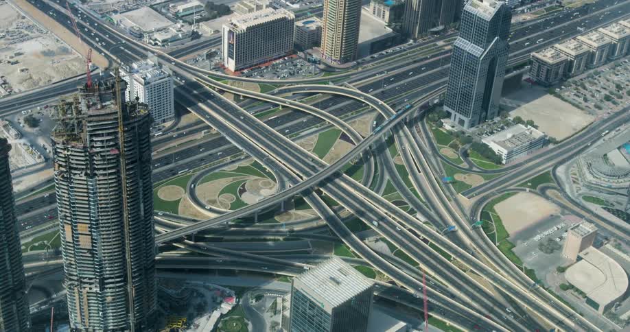 Aerial view of traffic on a busy highway intersection in a big city