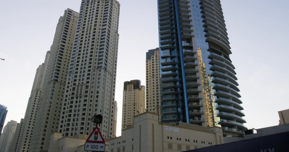 Construction crane sits on building near downtown skyscrapers