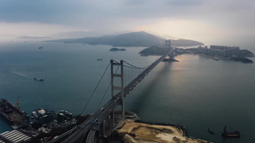 Aerial view of suspension bridge and ships
