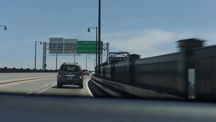 Vehicles drive on the highway