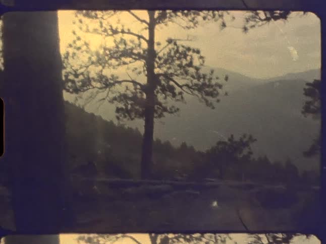 The sun is rising on the mountains