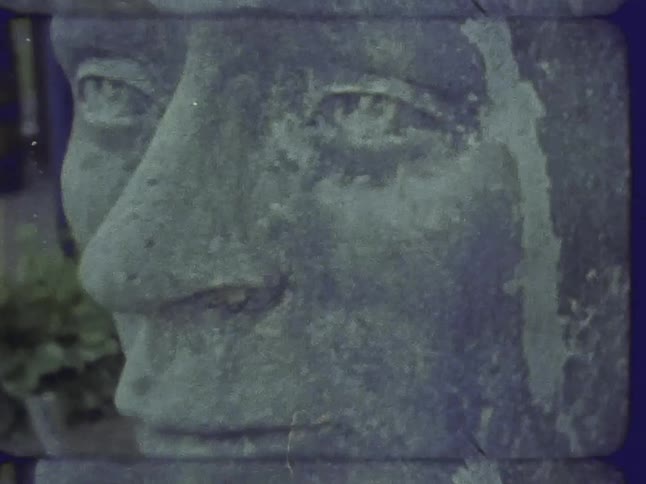 Film footage of a statue of a head
