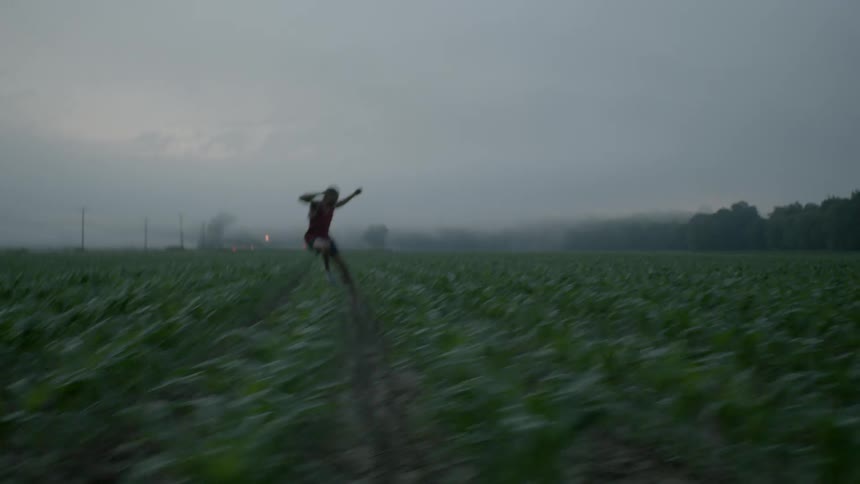A man runs through a field