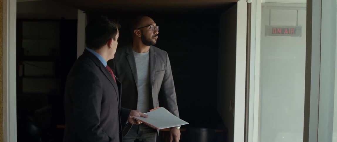 A real estate agent is showing off the home