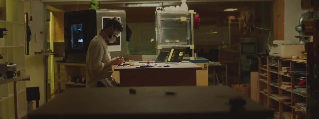 A man working on a painting
