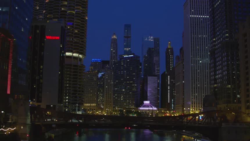 A driving view of downtown Chicago at night