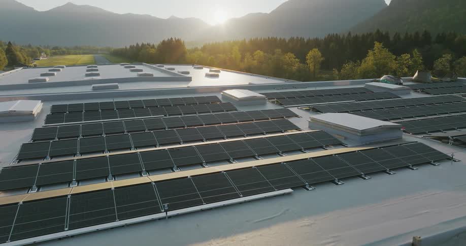 The sun is rising on the solar panels
