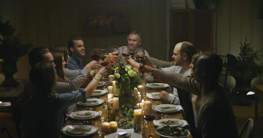 People raising their glasses in a toast
