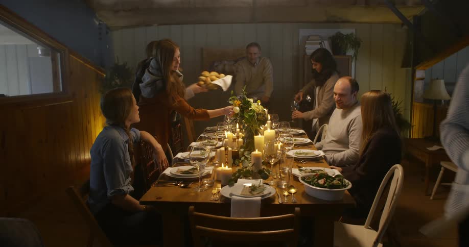 People preparing to eat a holiday feast