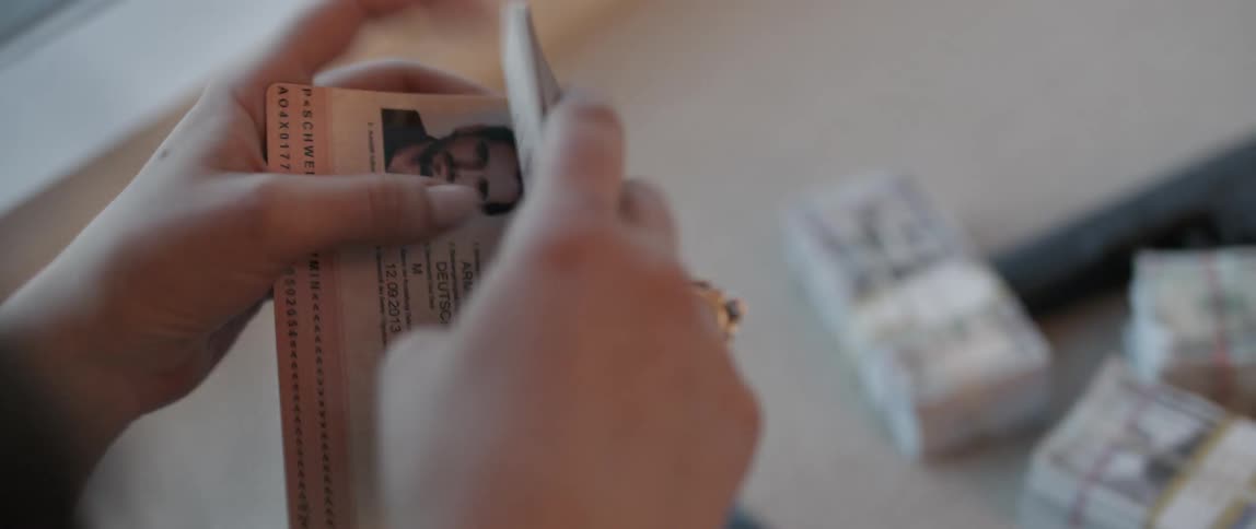 A person opens a passport
