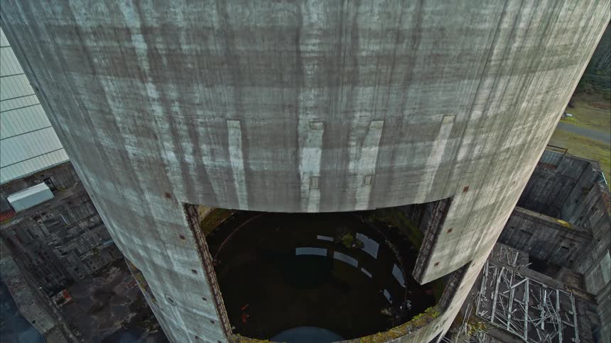 Aerial shot rising over a shut down nuclear power plant