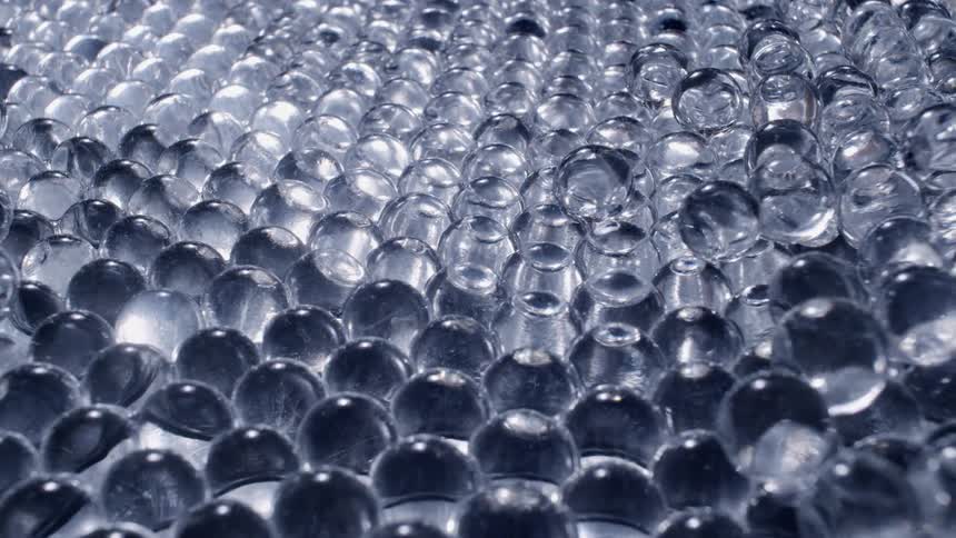 Bubbles are lit up and shine as they glow