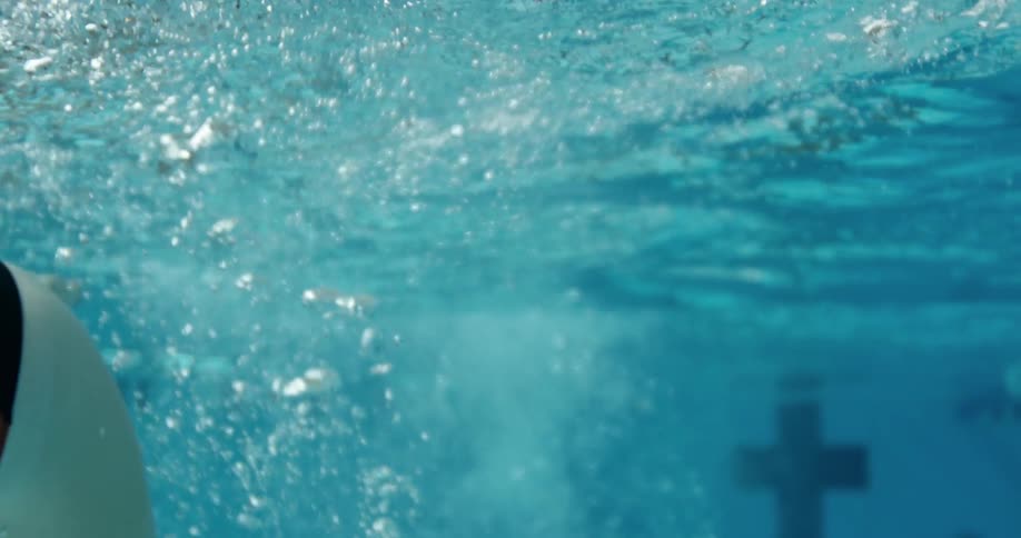 A woman swims in a pool