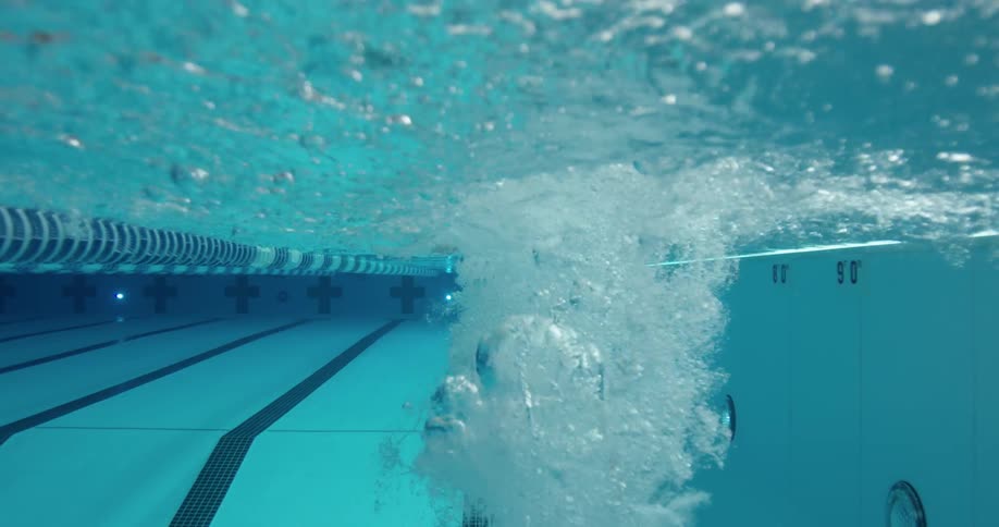 A woman swims in a pool