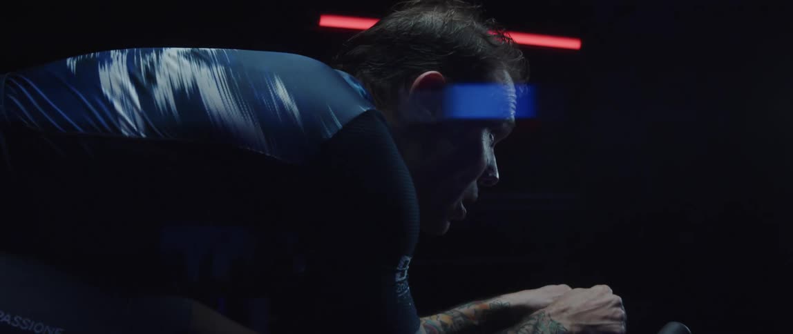 A man riding a stationary bike