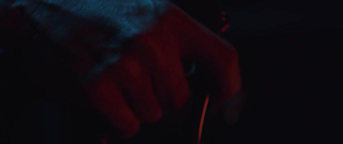 A person touches the handlebars