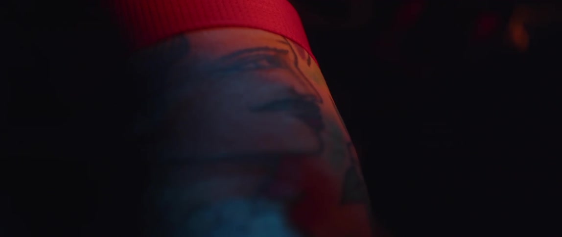 Close up of male cyclists arm with tattoo