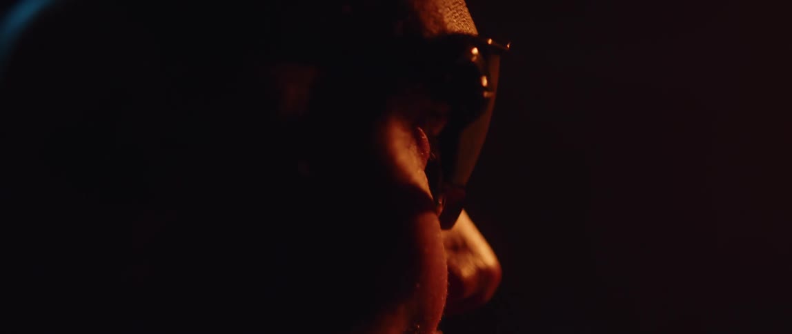 A man is moving in the dark room