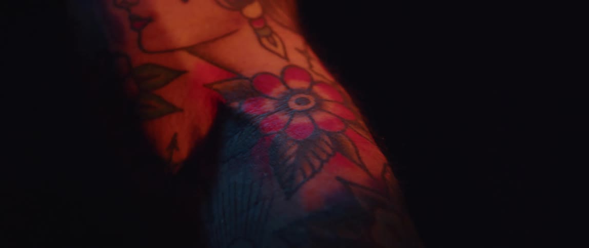A tattoo covered arm