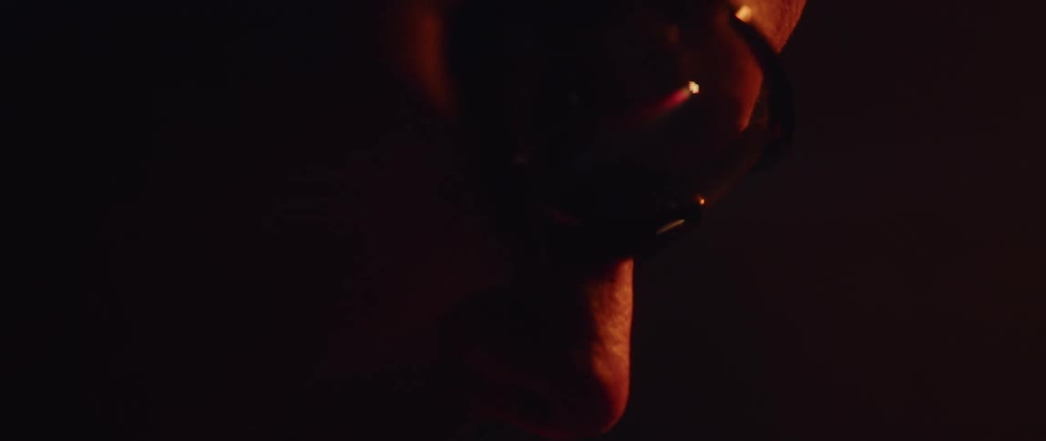 Close up view of a person wearing goggles is displayed