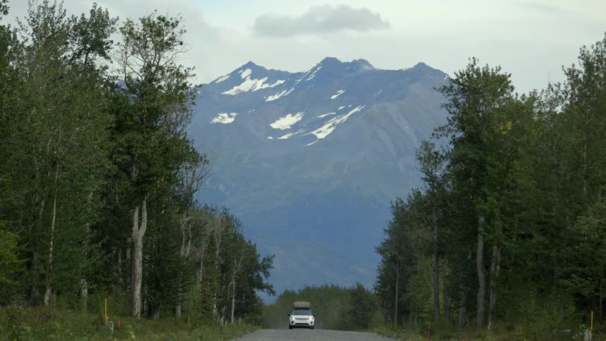 A car is coming from the road ahead
