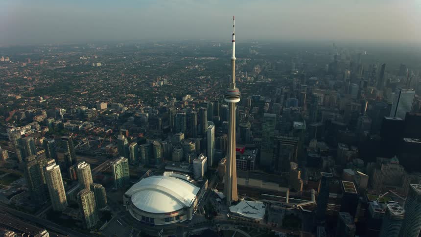 Aerial view of a downtown city is displayed at dusk