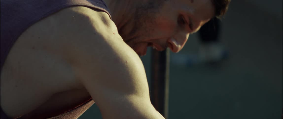 A man is stretching in the park