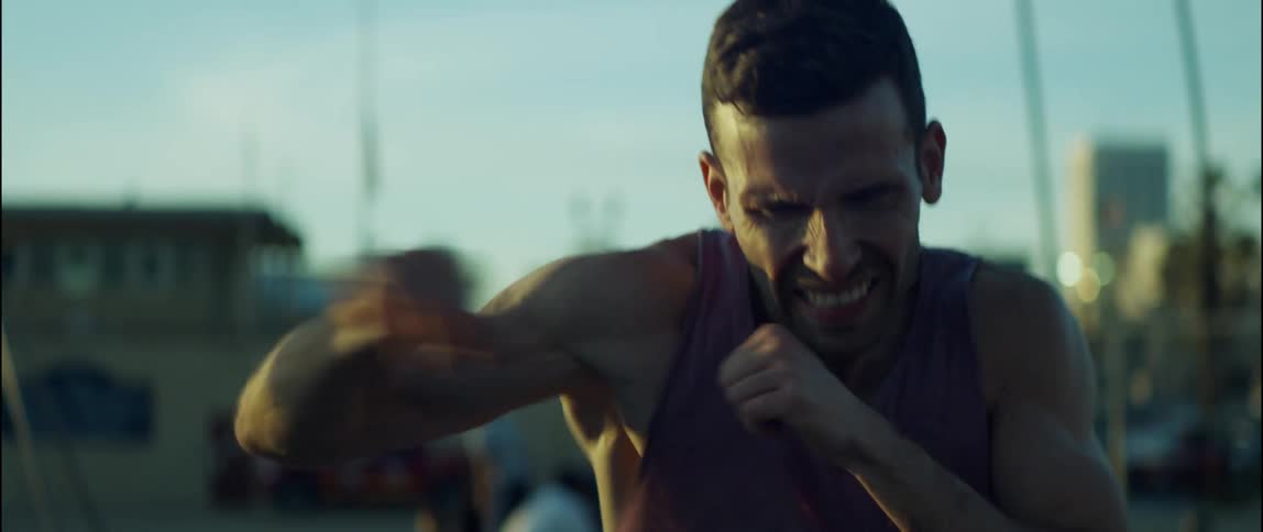A person practicing boxing outdoors