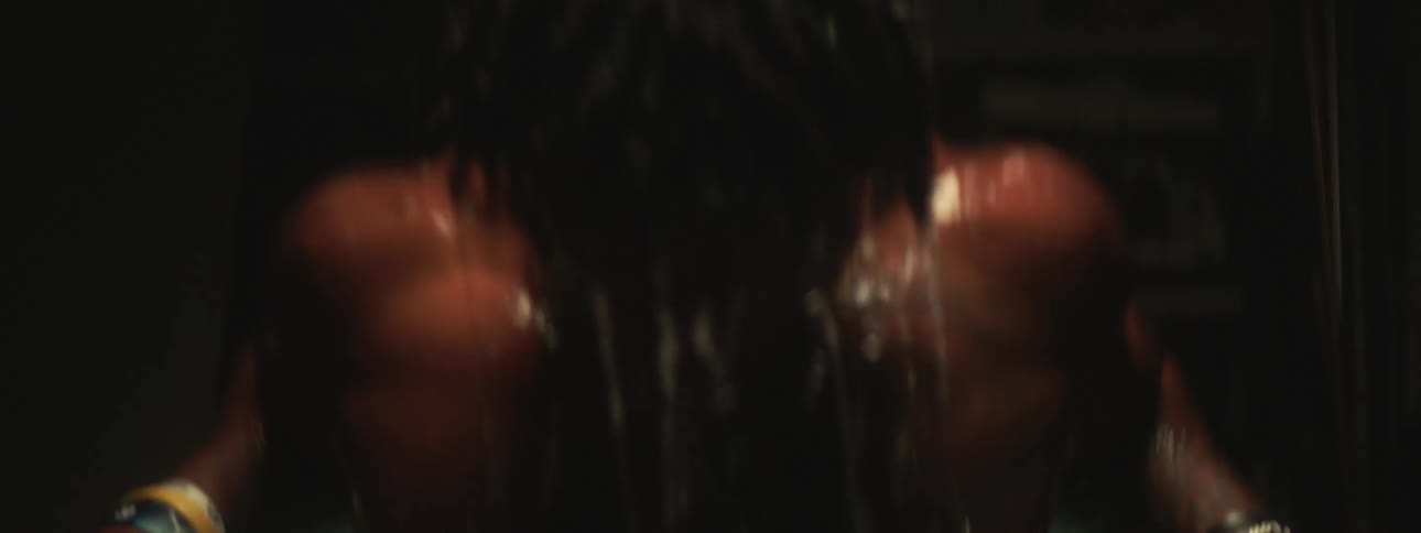 A man getting out of an ice bath