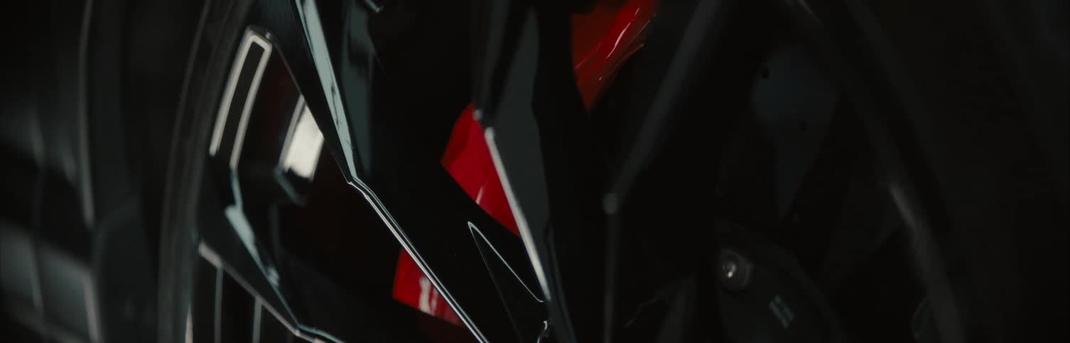 Light shines on the chrome design of a wheel