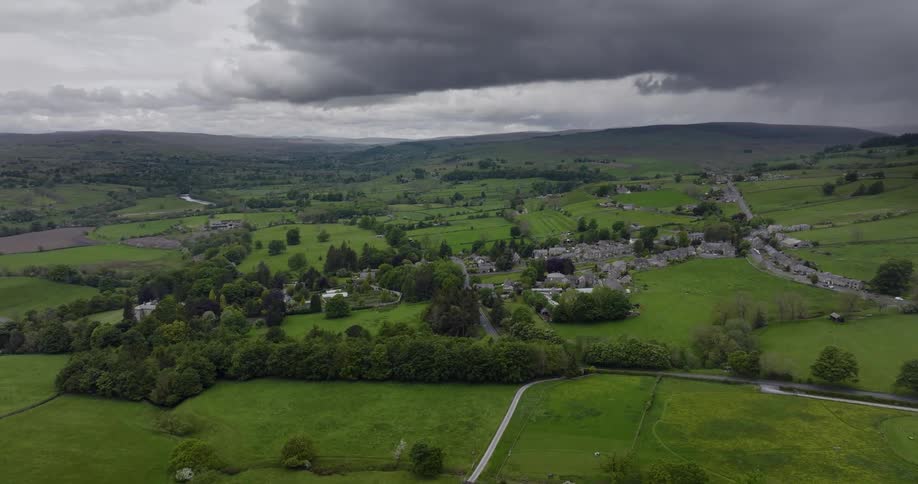 A neighborhood sits in the middle of sprawling fields