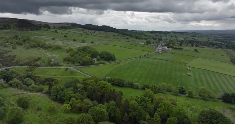 Aerial view of a the green fields on the countryside