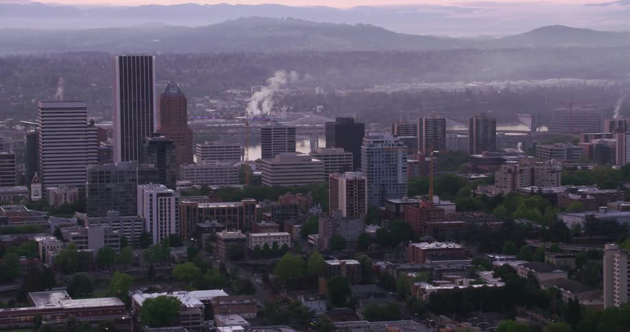 An aerial view of high rise office buildings in a city