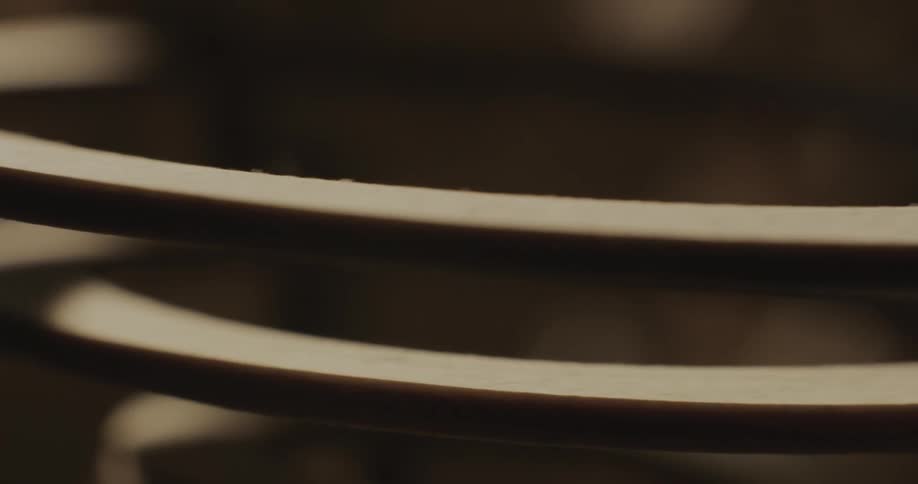 A curved track for metal ball bearings to roll on