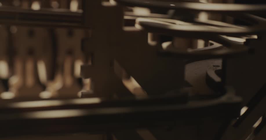 The ball rolls through the machine