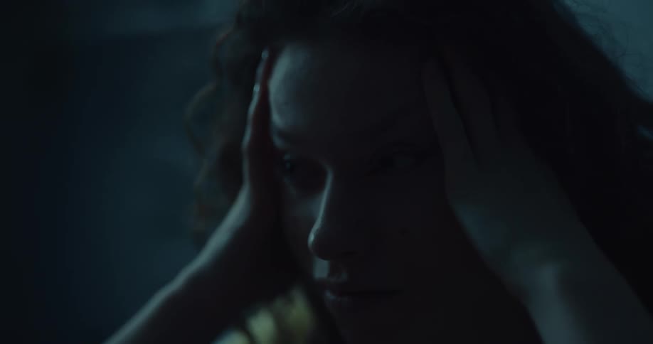 A woman waking up in the middle of the night
