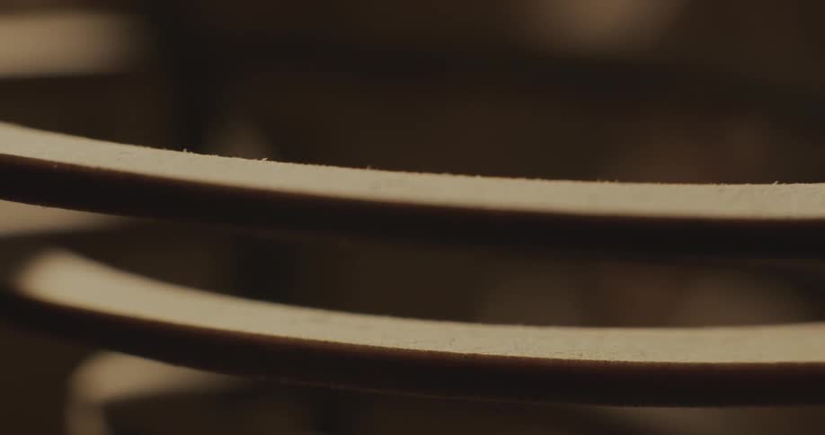 Metal ball bearings rolling on a track