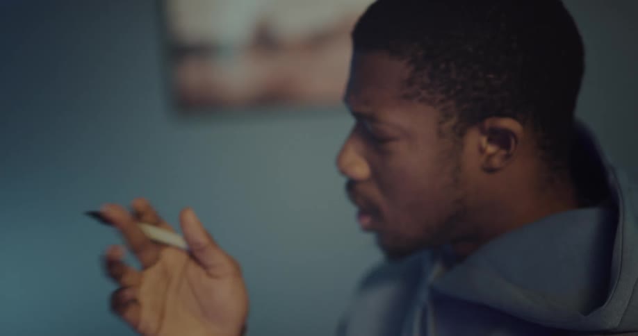 Man holding a pen on his hand thinking and writing down his thoughts