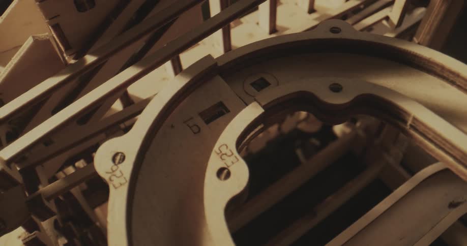 The ball rolls through the machine