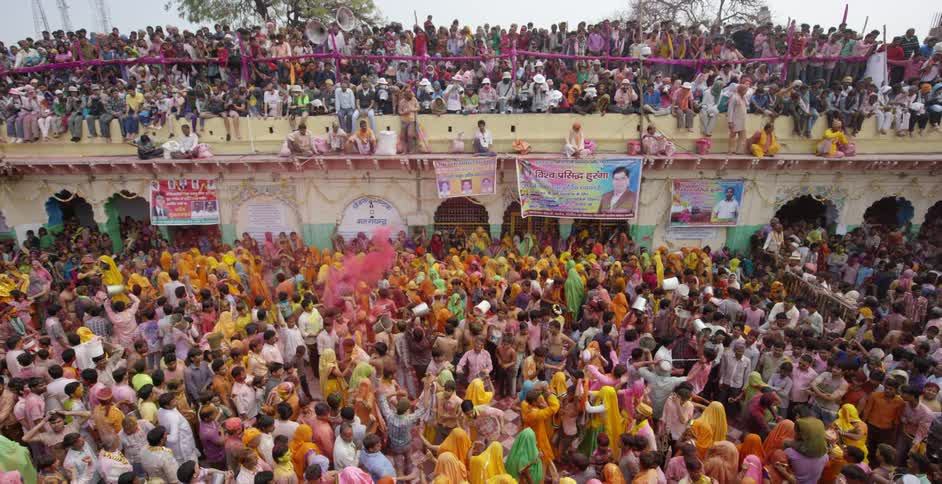A group of people dressed in colorful clothing