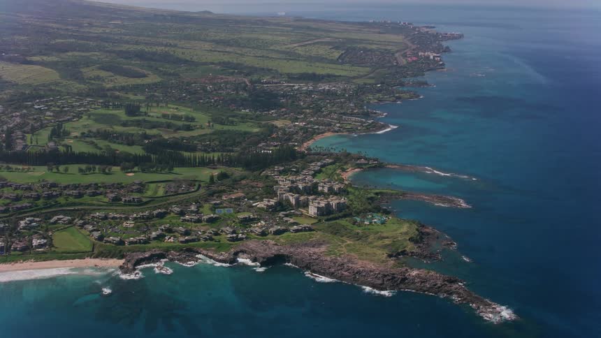 An aerial view of the ocean and shore