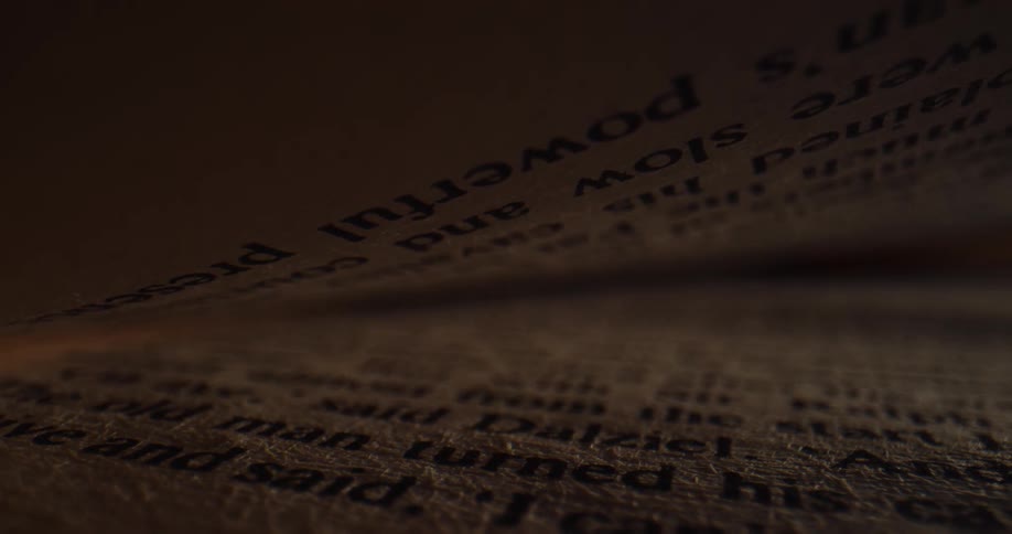 Pages in a book fall and close