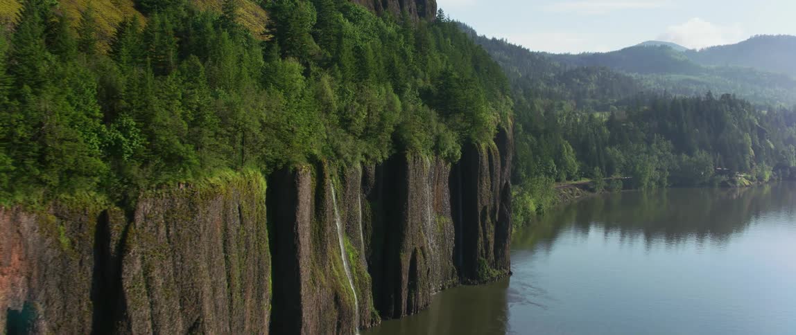 A cliff on the shore of the water