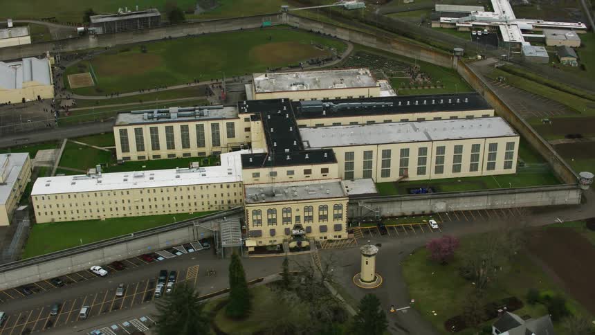 Large factory buildings dot the landscape