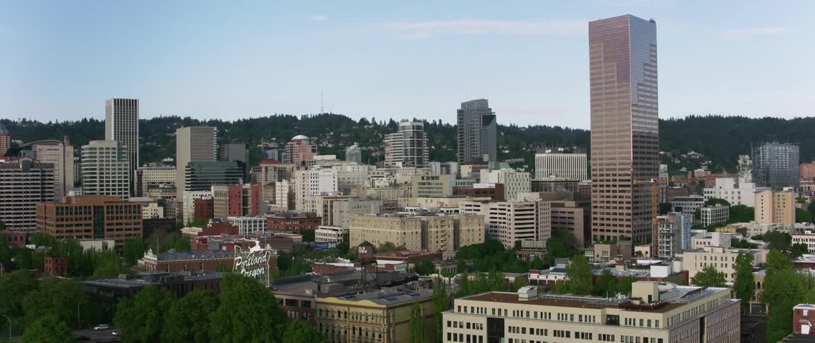 Cars traveling across the bridge to portland oregon are greeted by the white stag sign
