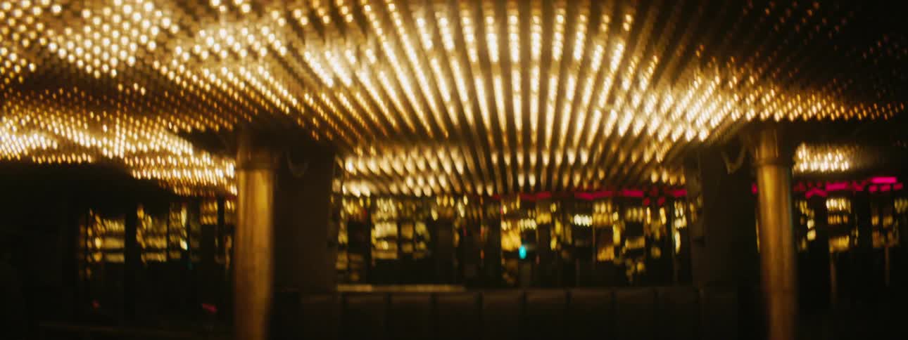 Lights flashing on a building at night