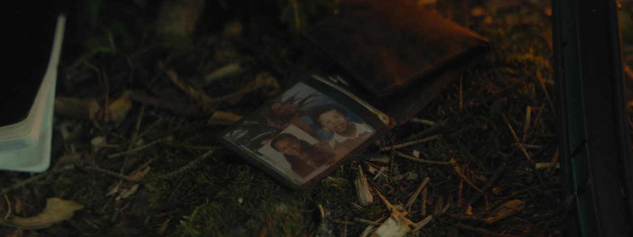 A vehicle crash with a wallet on the ground