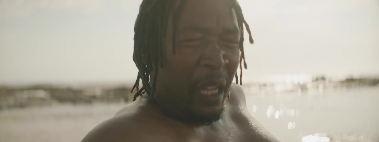 A man is breathing heavily in the water
