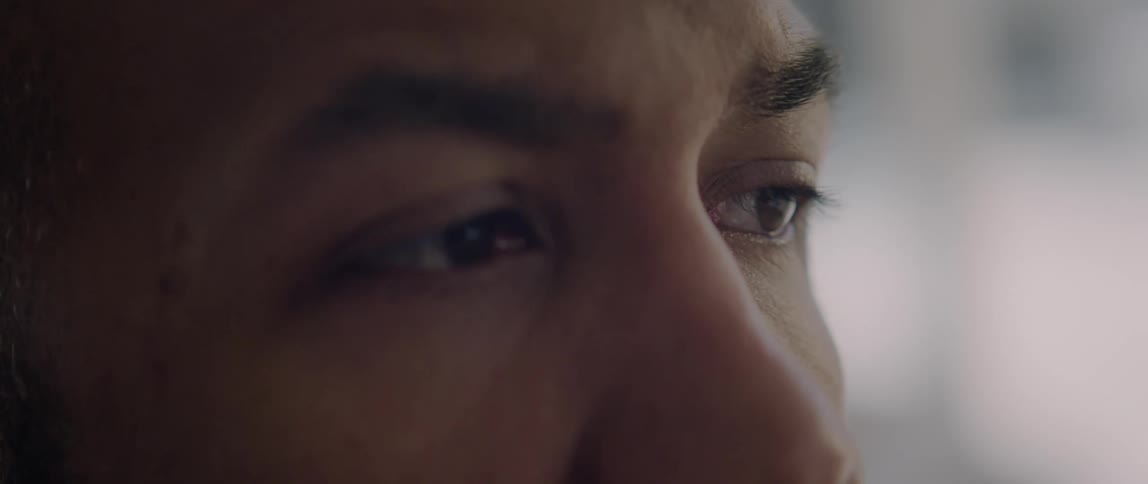 Close up of the eyes of a man thoughtfully looking at something out of frame